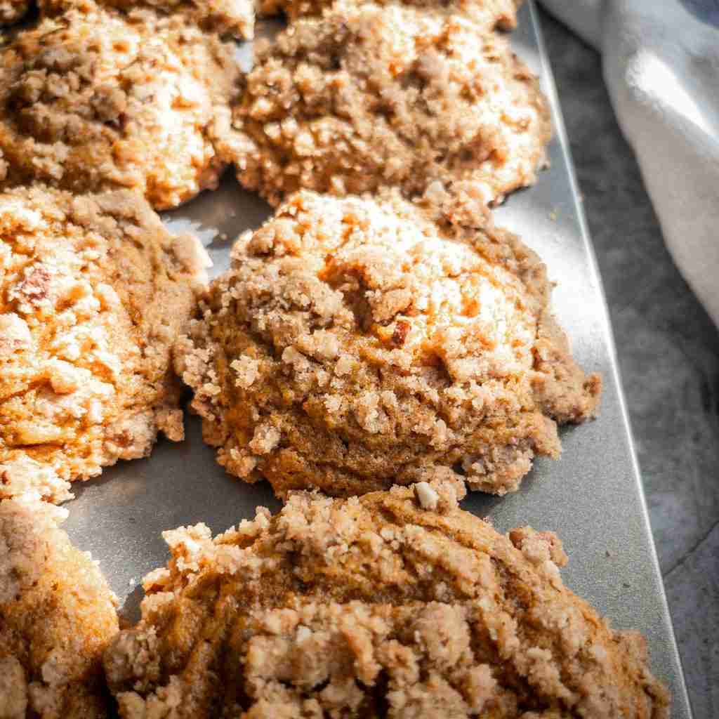 Pumpkin Spice Muffins with Cream Cheese Filling and Pecan Streusel Topping