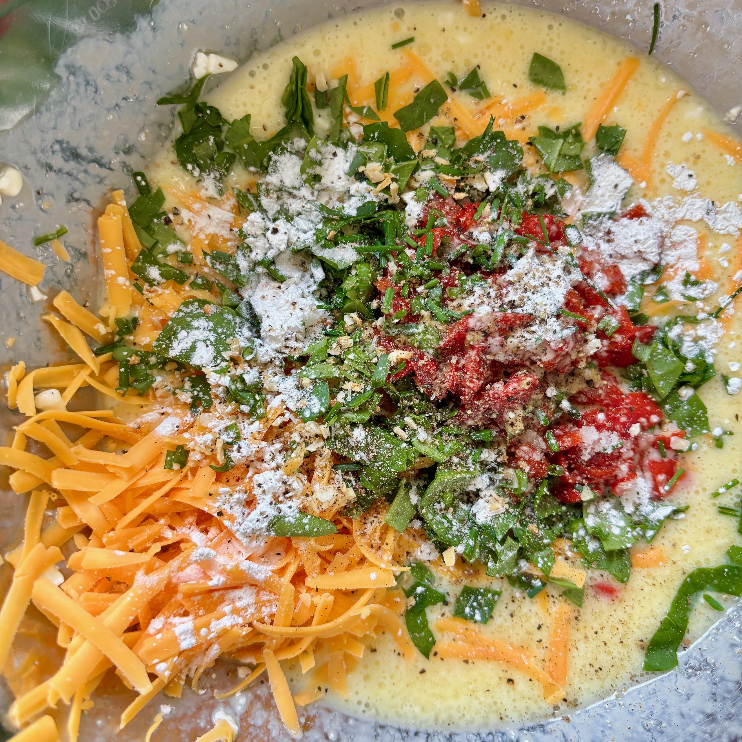 Cheesy veggie egg bites with spinach and peppers