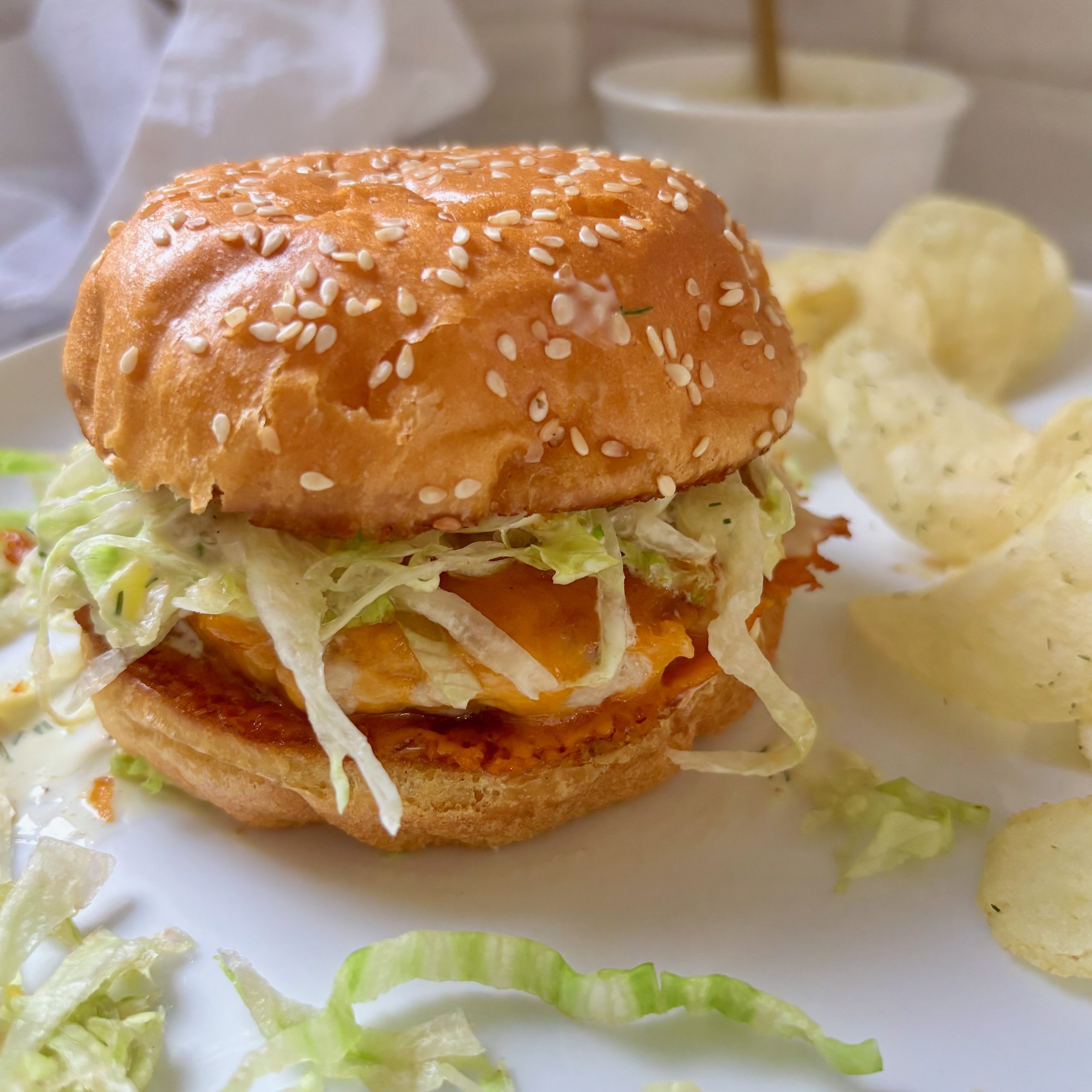 Close-up of skillet turkey burger topped with melty cheese
