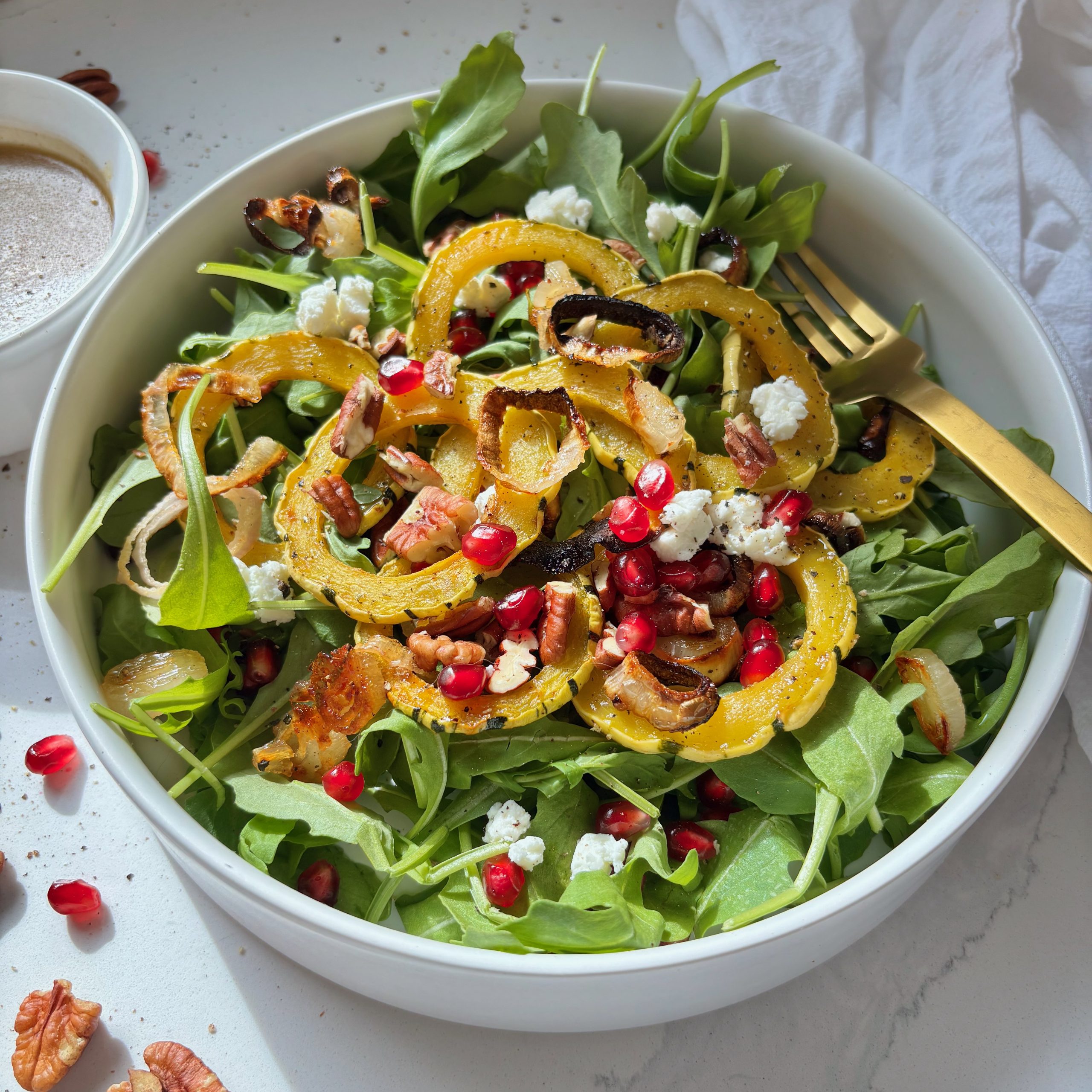 Golden Roasted Delicata Squash and Arugula Salad with Goat Cheese