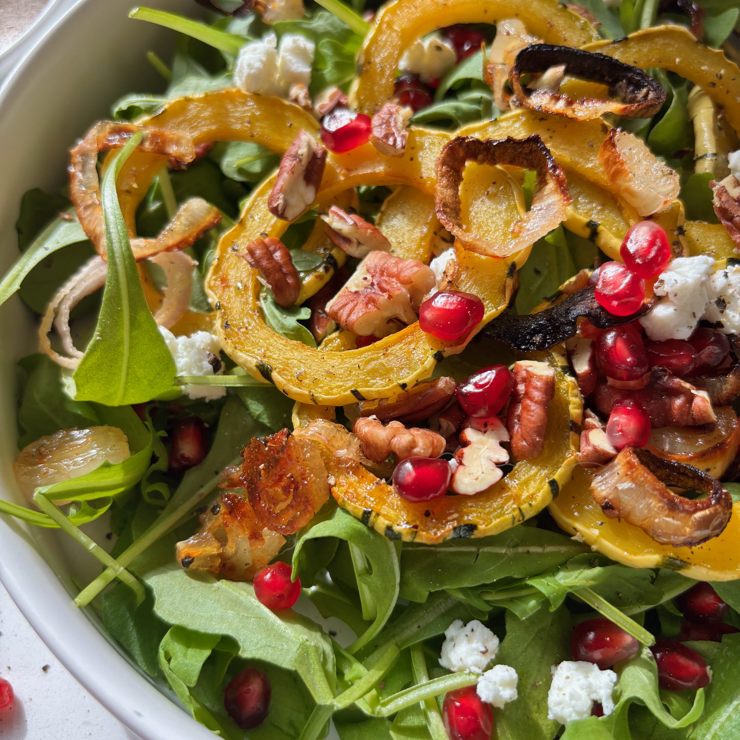 Golden Roasted Delicata Squash and Arugula Salad with Goat Cheese
