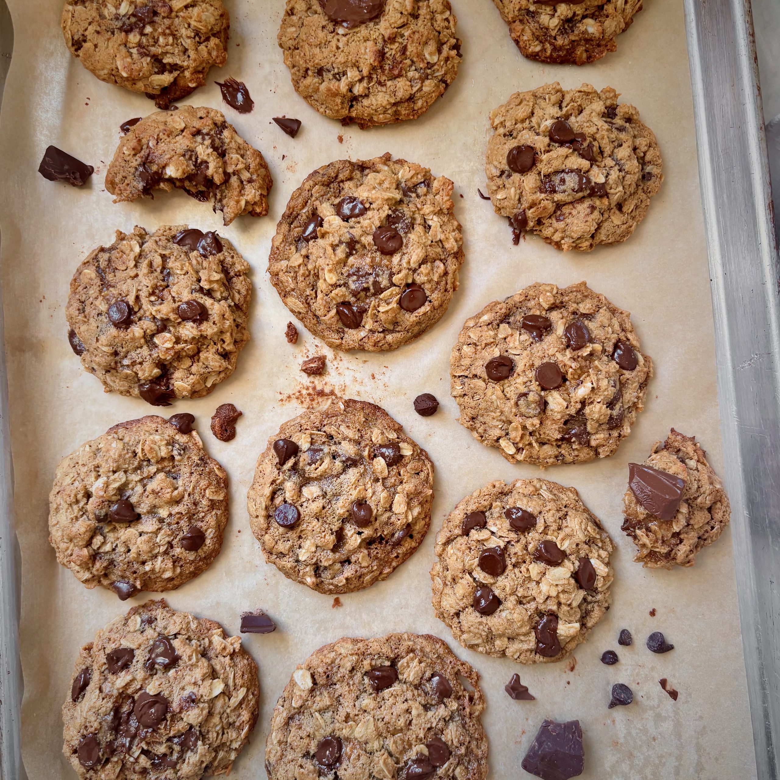 Oatmeal almond flour chocolate chip cookies on a baking sheet