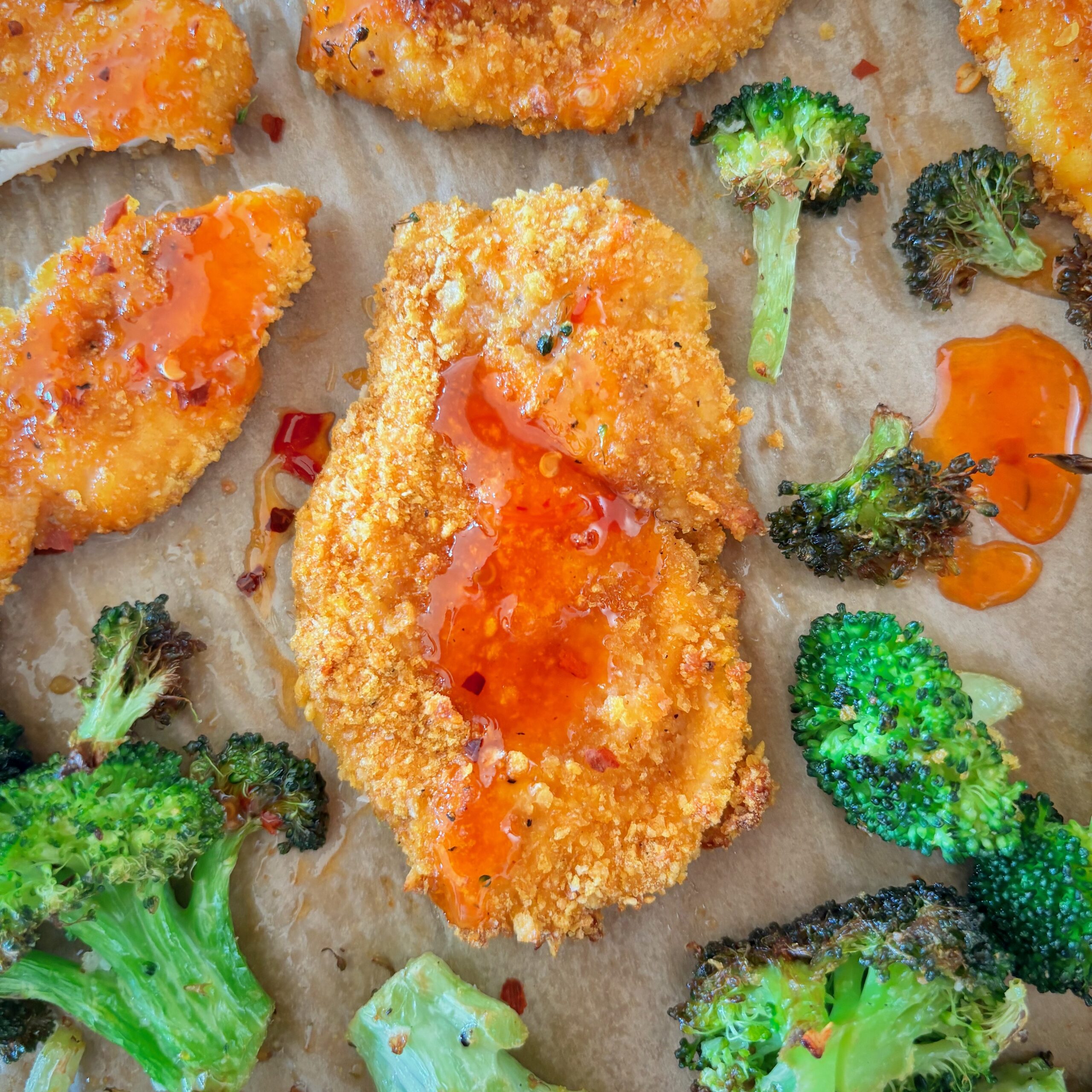 Sweet chili honey sauce on crispy chicken strips