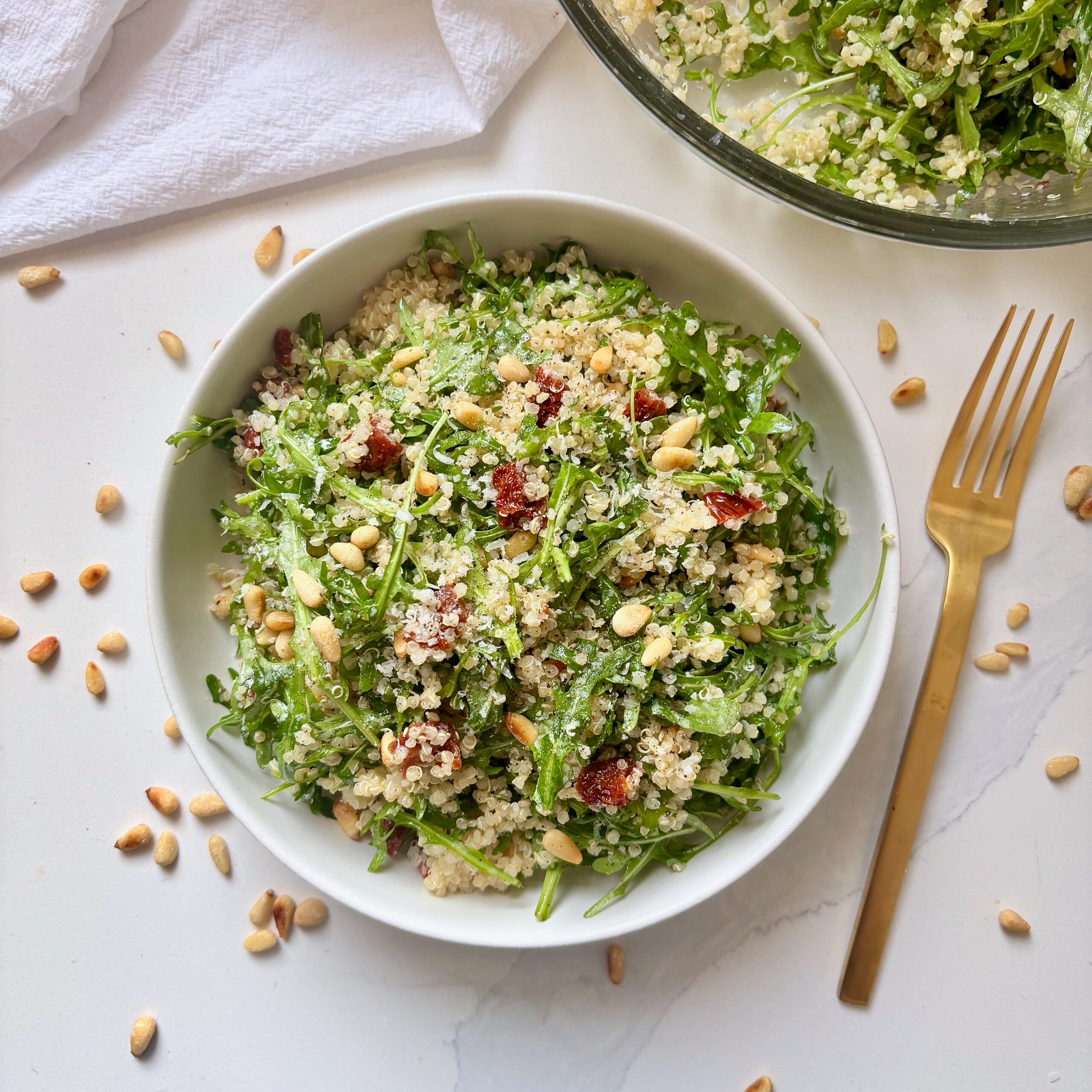 Lemon parmesan quinoa arugula salad served as a side dish