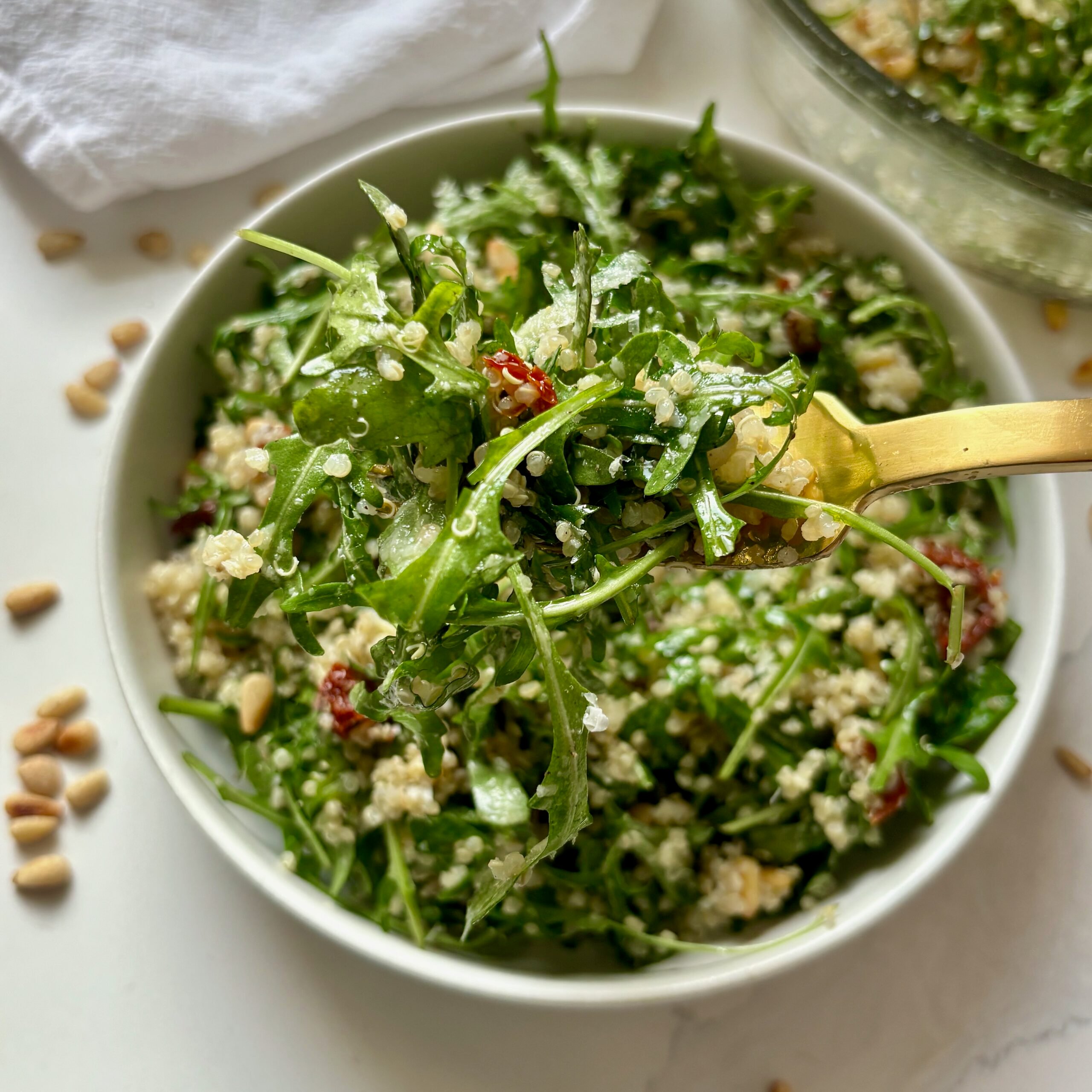 Quinoa Arugula Salad on fork