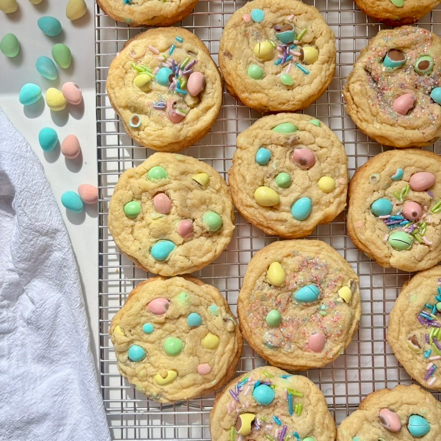 Overhead view of mini egg cookies with extra chocolate mini eggs on top