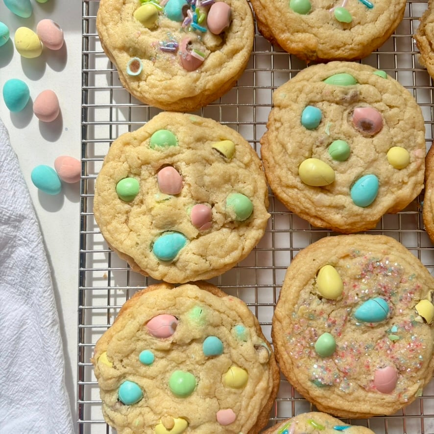 tray of mini egg cookies with gooey centres and colourful chocolate pieces
