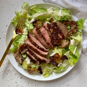 Steak Caesar Salad with Garlic Parmesan Smashed Potato Croutons