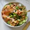Crunchy Salmon Rice Bowls with avocado, crispy onions, sesame seeds, and rice.