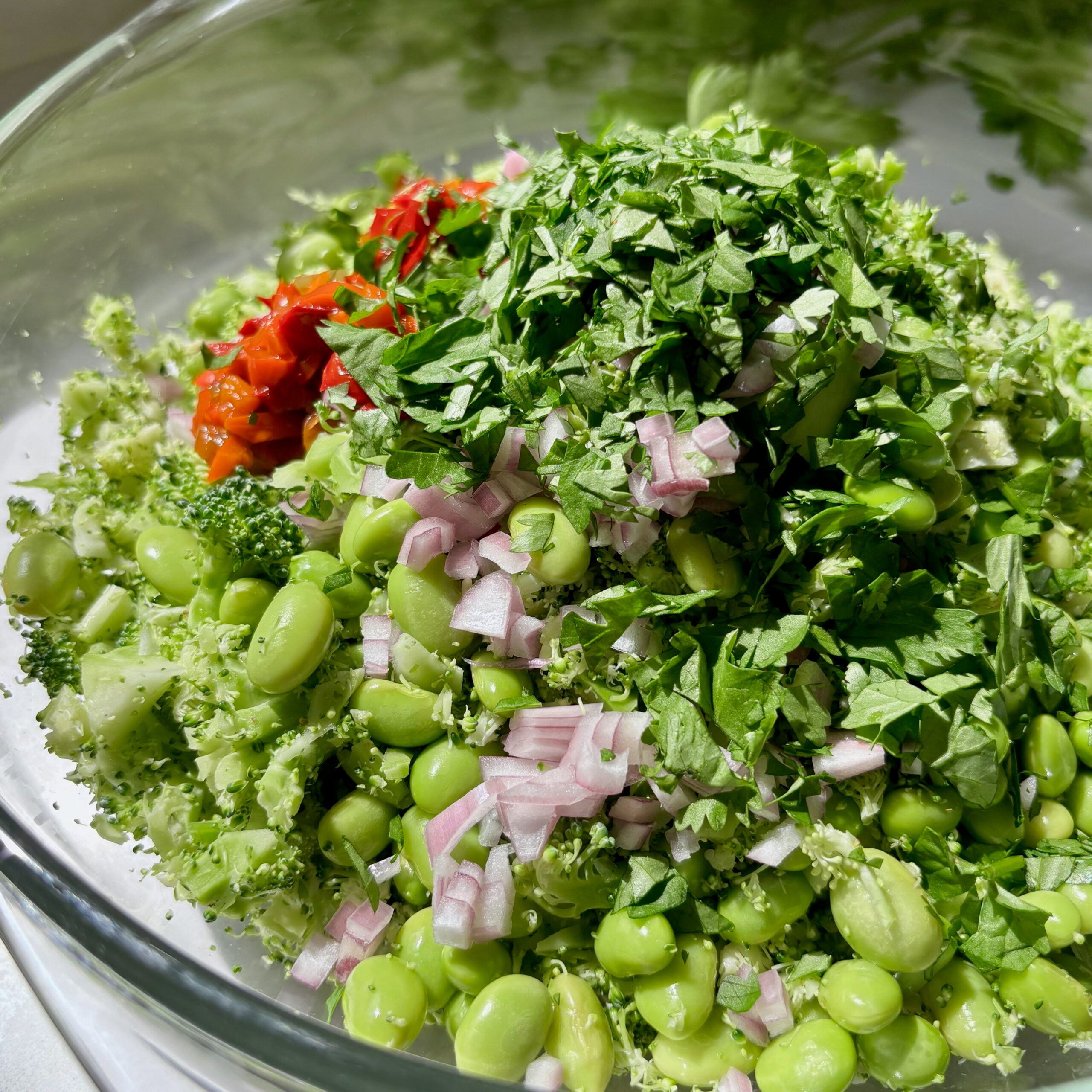 Broccoli florets pulsed in a food processor for Super Chop Broccoli Salad.