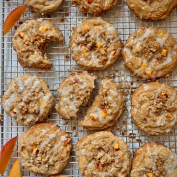 Fresh Peach Crisp Cookies with diced peaches, oat crumble topping and drizzle