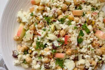 Super Chop Cauliflower Salad with tahini dressing in a serving bowl