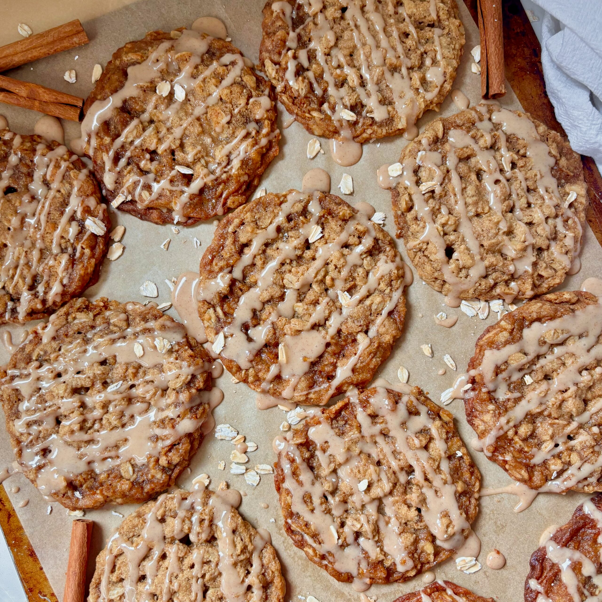 Maple spice brown butter oatmeal cookies drizzled with maple glaze